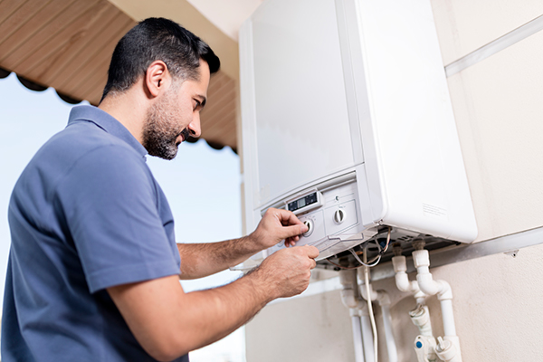 tech work on boiler